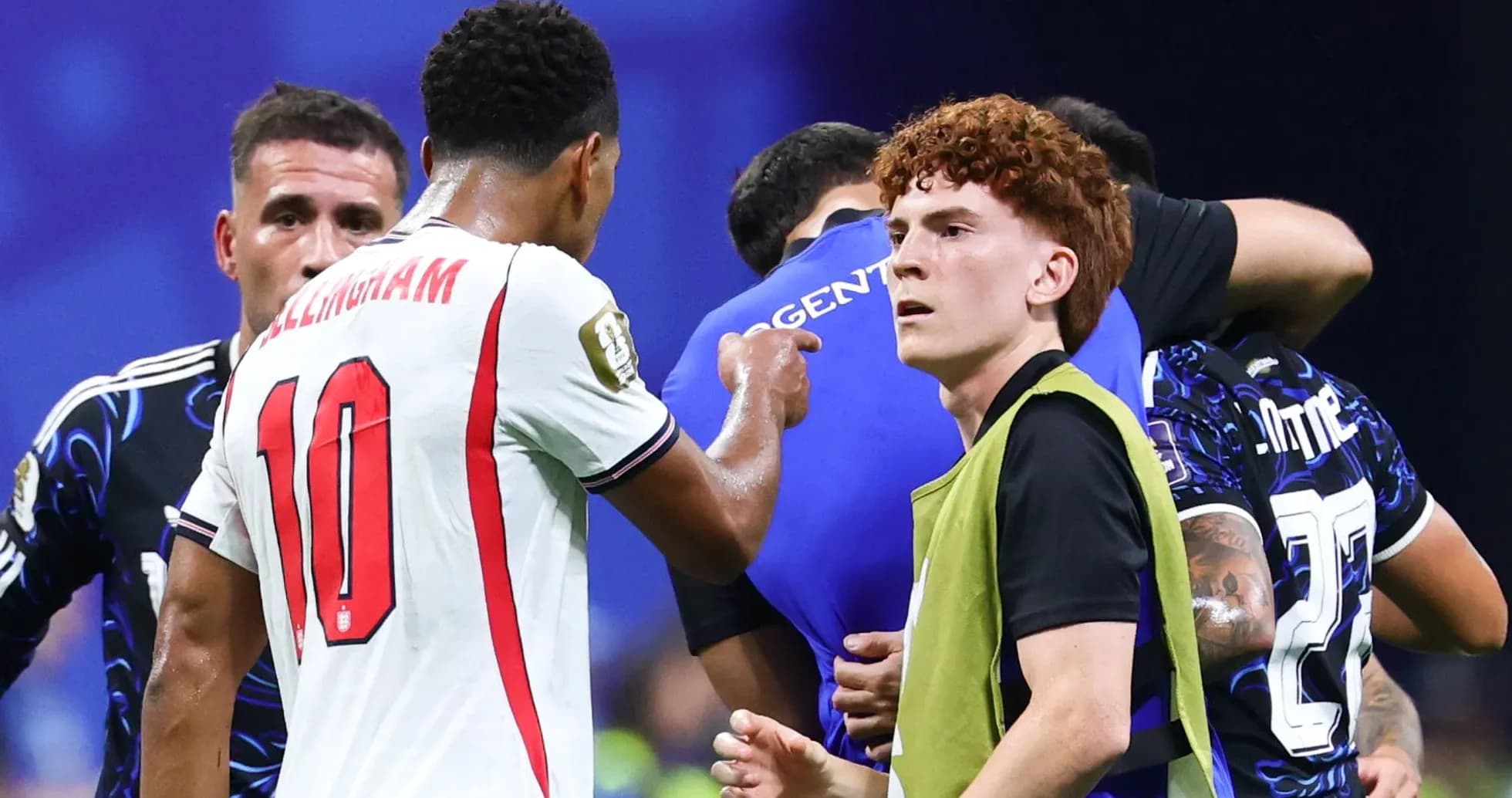 Players interacting during a football match moment Players interacting during a football match moment