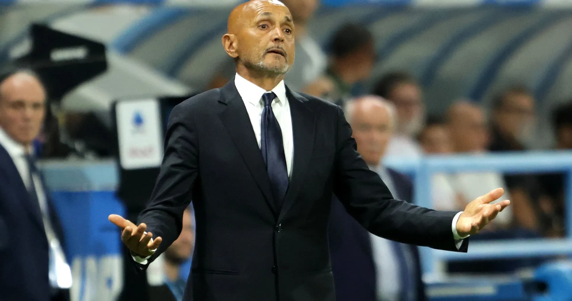 Manager gesturing during a match on the sidelines Manager gesturing during a match on the sidelines