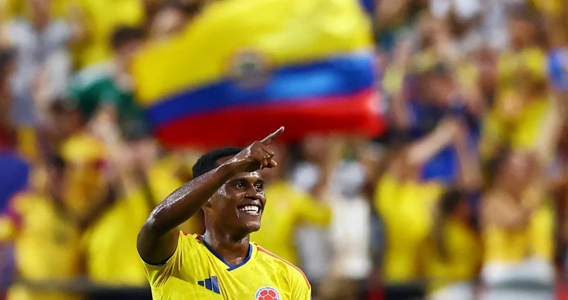 Player celebrating with fans during a match Player celebrating with fans during a match