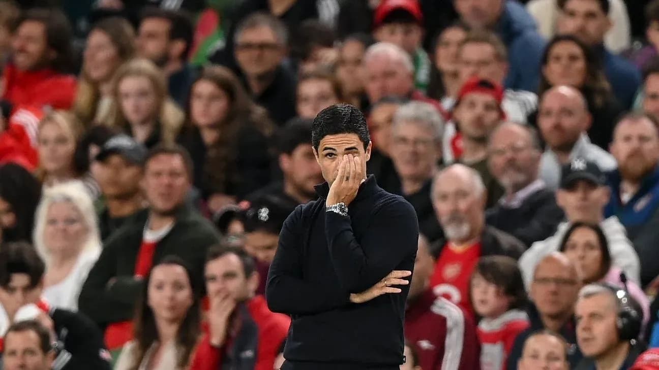Manager observing the game with concerned expression Manager observing the game with concerned expression