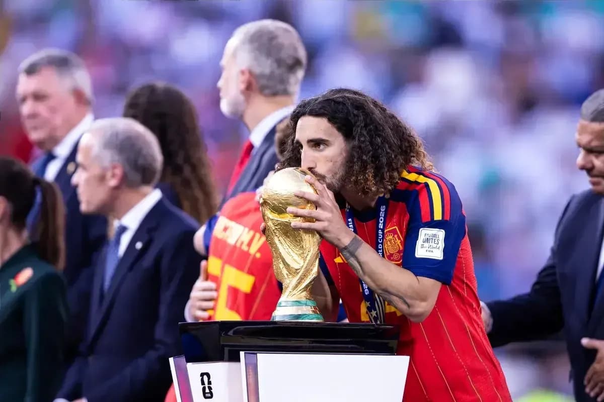 Player kissing FIFA World Cup trophy on podium Player kissing FIFA World Cup trophy on podium