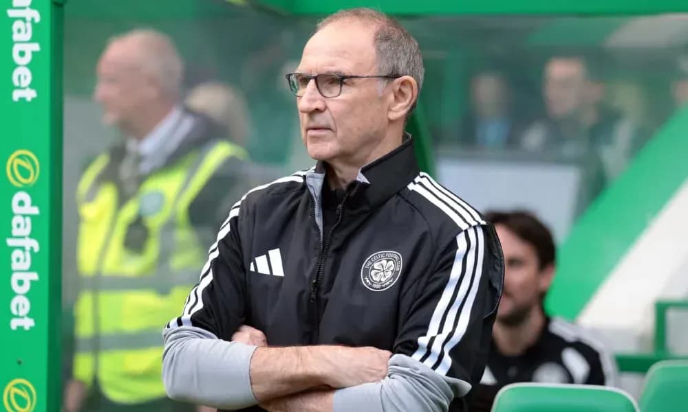 Manager observing match from sidelines during game Manager observing match from sidelines during game