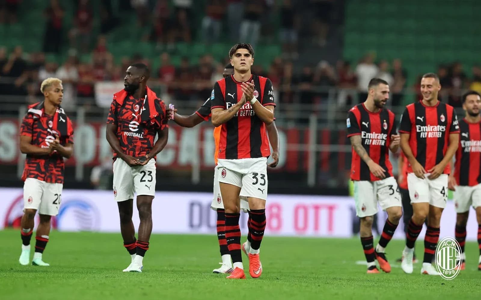 AC Milan players celebrating after a match AC Milan players celebrating after a match