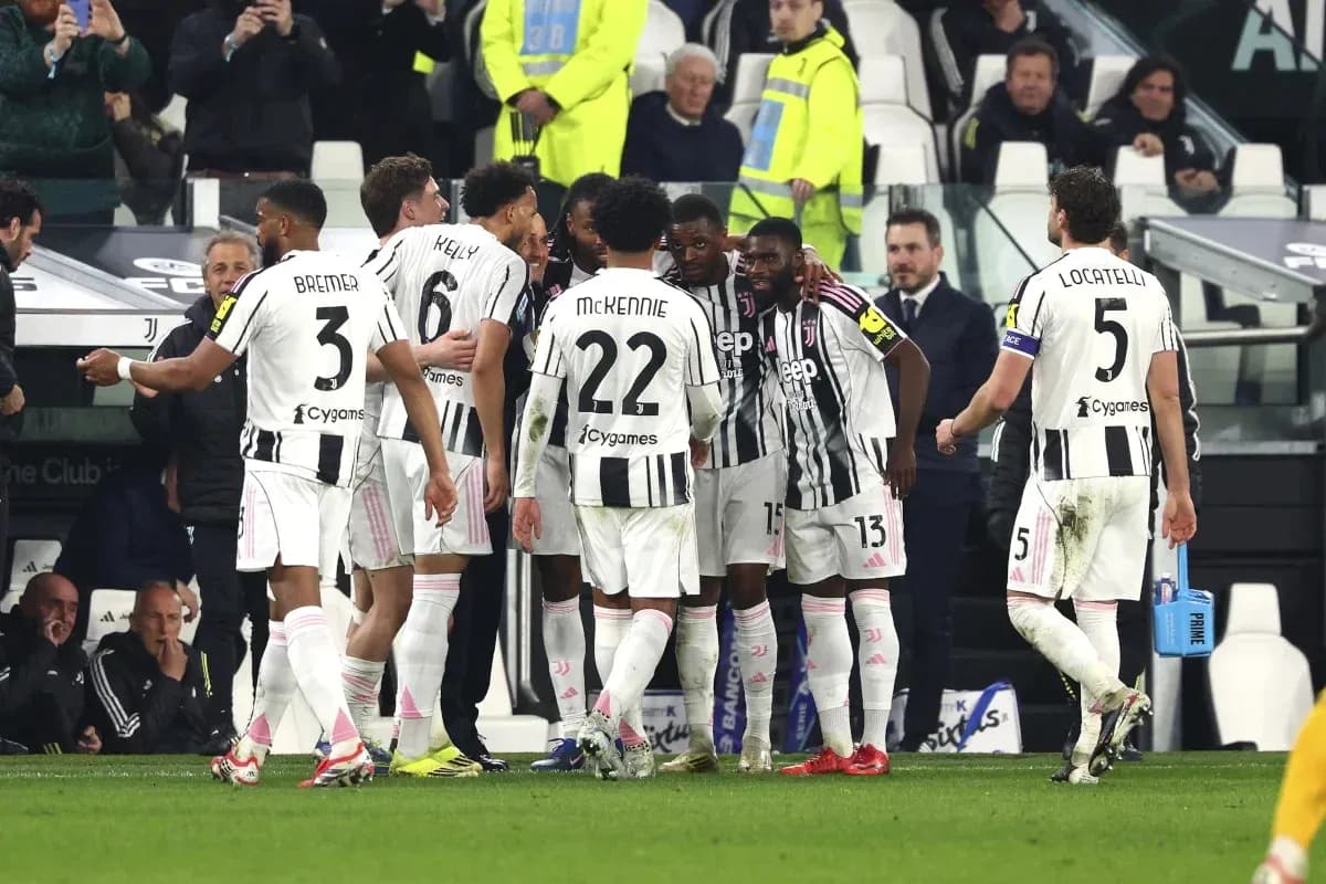 Juventus players celebrating during a match huddle Juventus players celebrating during a match huddle