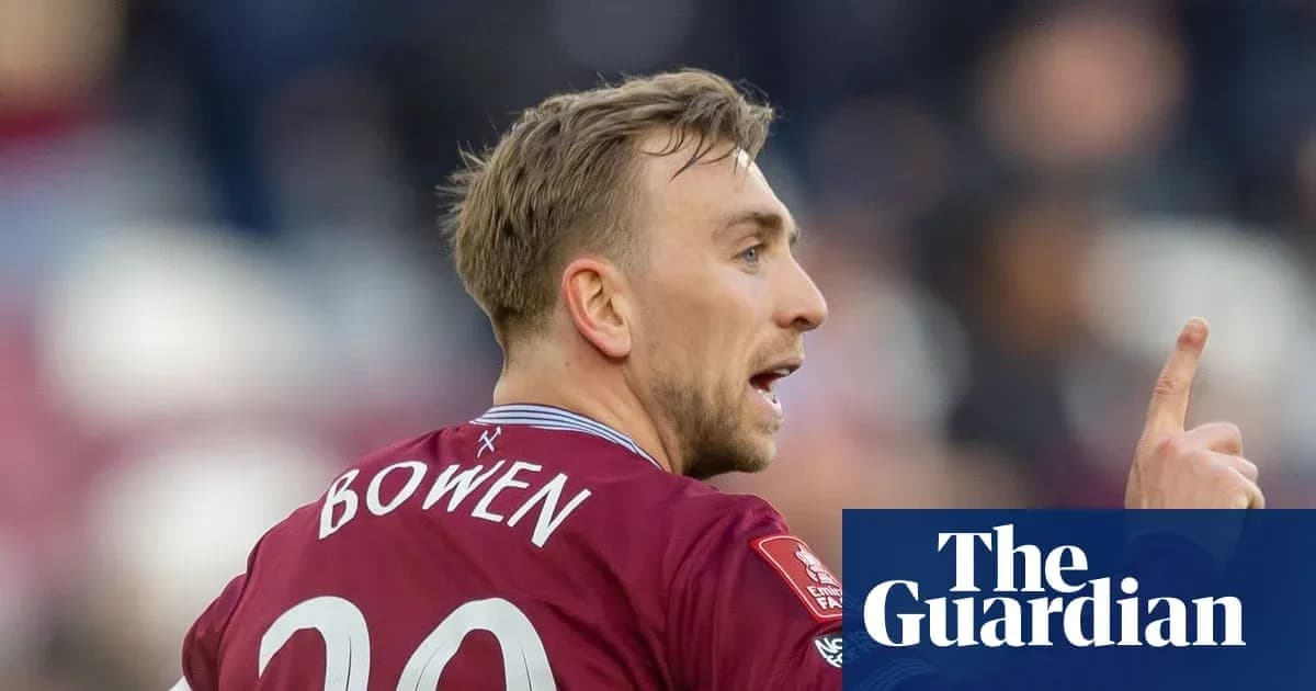 Player in maroon jersey gesturing during match Player in maroon jersey gesturing during match