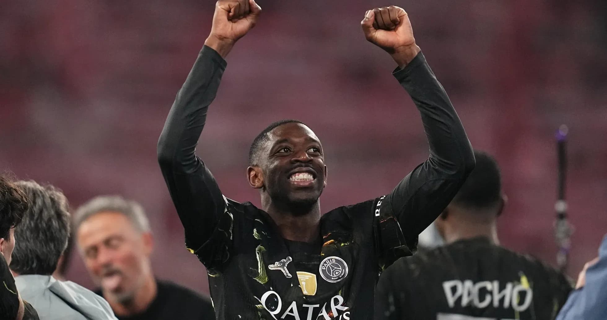 Player celebrating with raised fists after match Player celebrating with raised fists after match