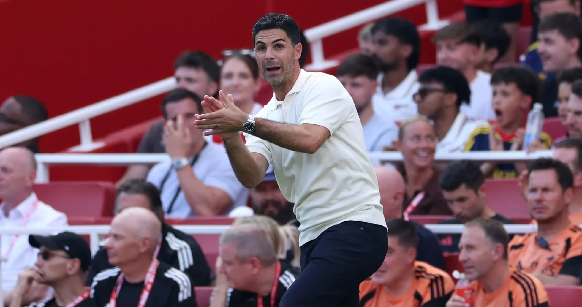 Coach gesturing from the sidelines during match Coach gesturing from the sidelines during match