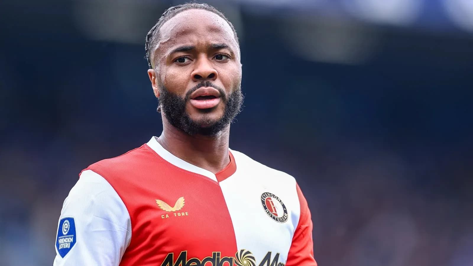 Player wearing Feyenoord kit on the pitch Player wearing Feyenoord kit on the pitch