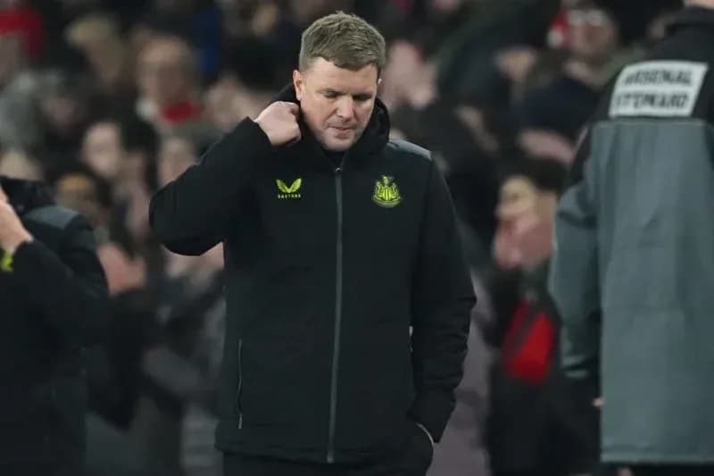 Newcastle United manager walking off pitch after match Newcastle United manager walking off pitch after match