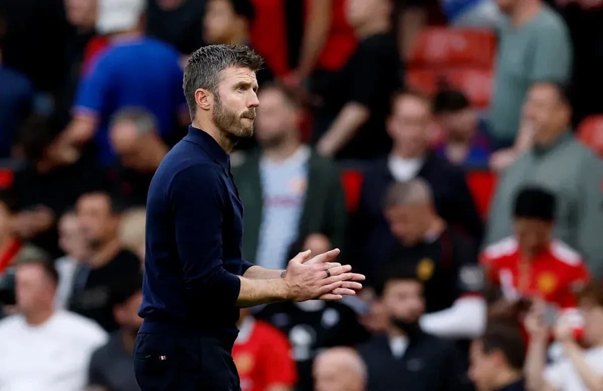 Coach applauding during a match at Old Trafford Coach applauding during a match at Old Trafford