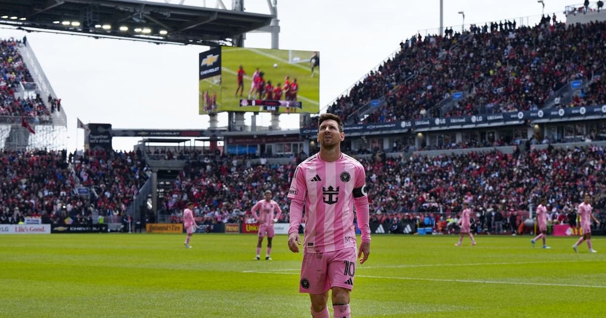 Lionel Messi walking on field during match Lionel Messi walking on field during match