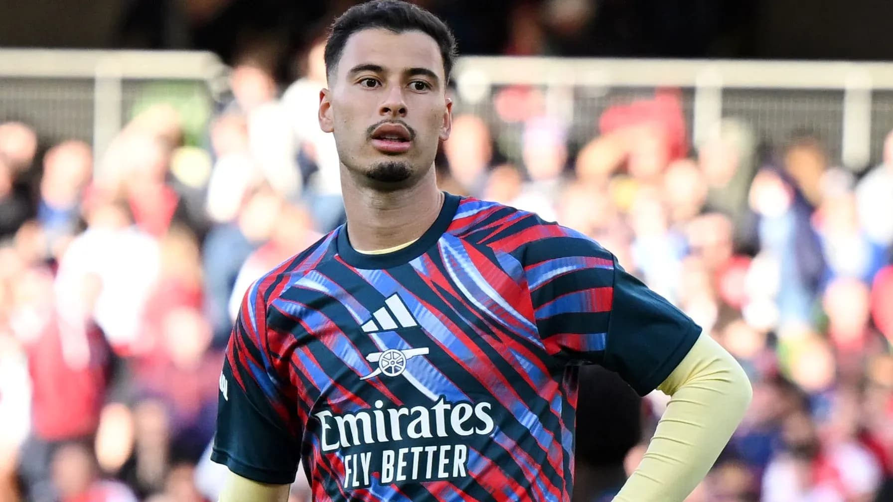 Goalkeeper in colorful kit during warm-up Goalkeeper in colorful kit during warm-up
