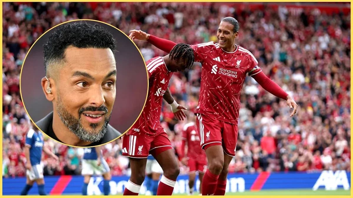Liverpool players celebrating goal in stadium Liverpool players celebrating goal in stadium