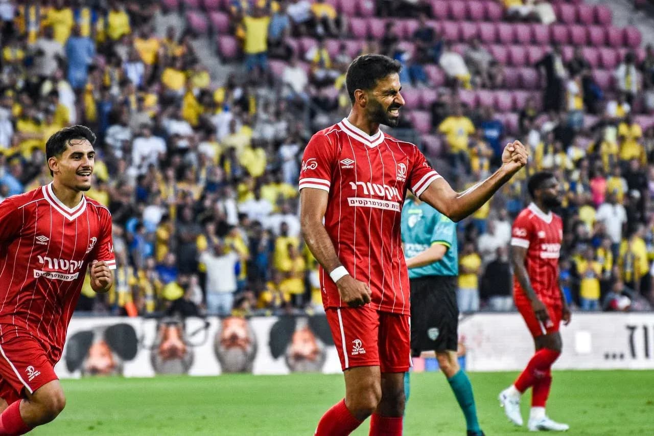 Hapoel Beer Sheva players celebrating during match Hapoel Beer Sheva players celebrating during match