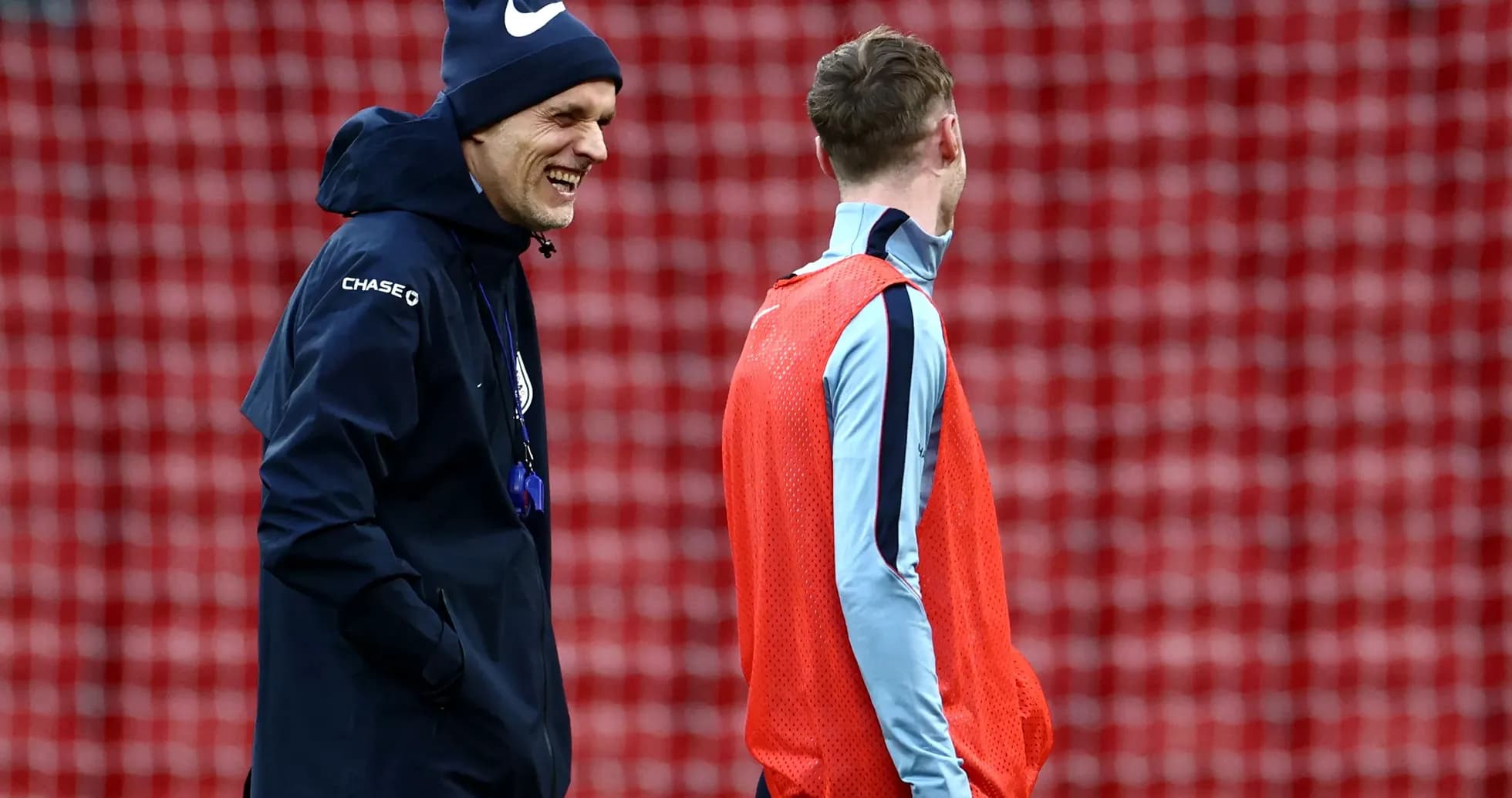 Coach laughing with player during training session Coach laughing with player during training session