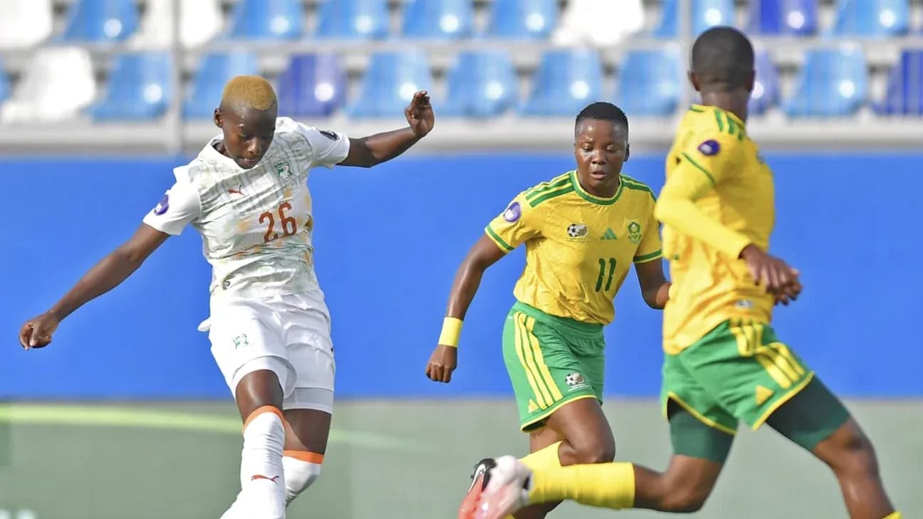 Player from Ivory Coast kicking ball against South Africa Player from Ivory Coast kicking ball against South Africa