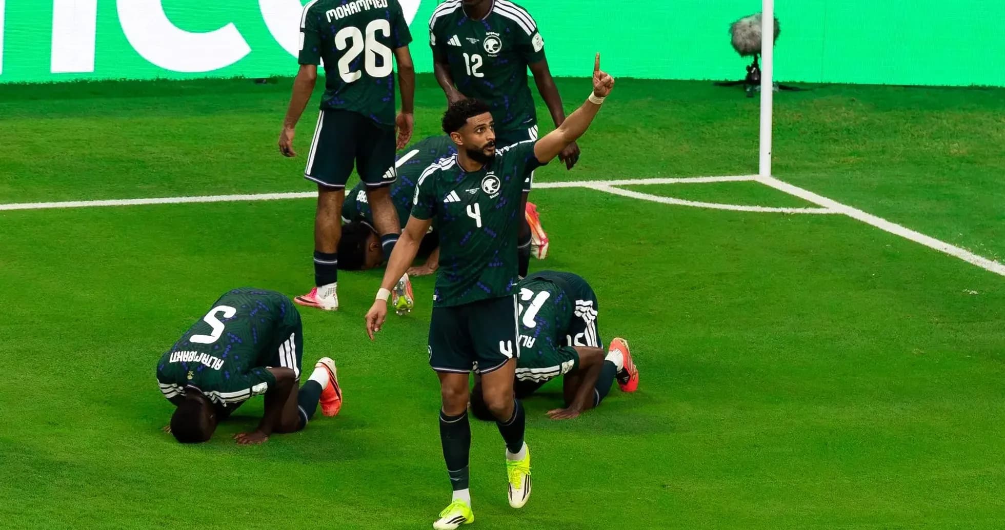 Saudi players celebrating during World Cup match Saudi players celebrating during World Cup match