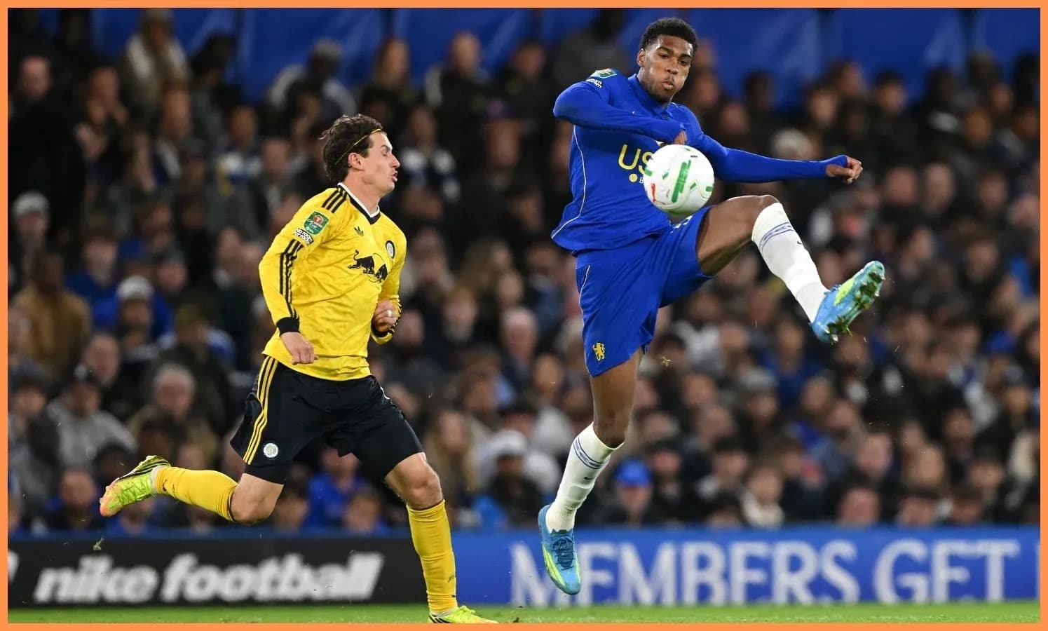 Player in blue controlling the ball during match Player in blue controlling the ball during match
