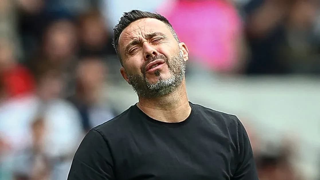 Manager reacting during a tense moment on the sidelines Manager reacting during a tense moment on the sidelines