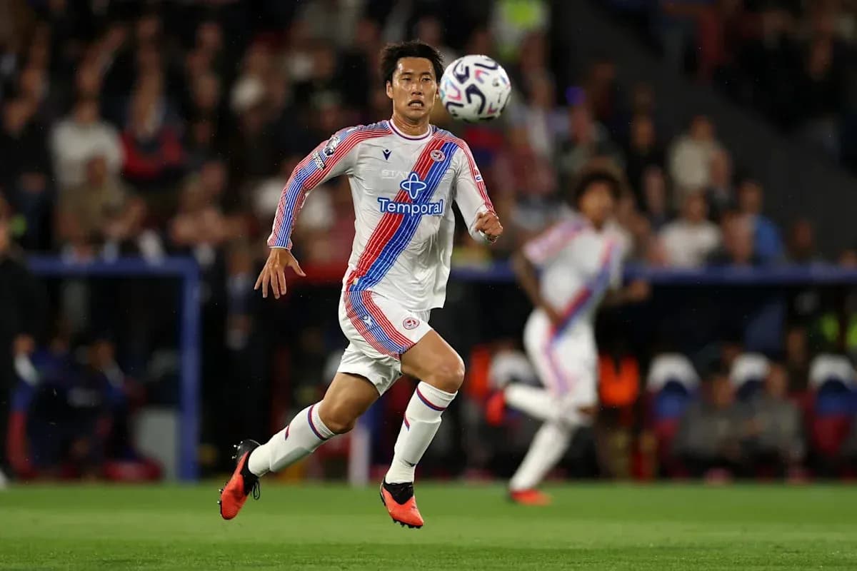 Player running after the ball during match Player running after the ball during match