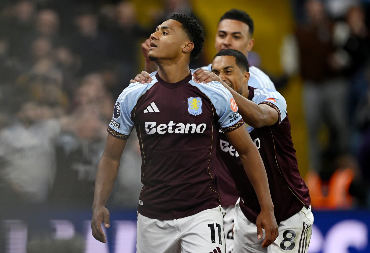 Aston Villa players celebrating a goal Aston Villa players celebrating a goal