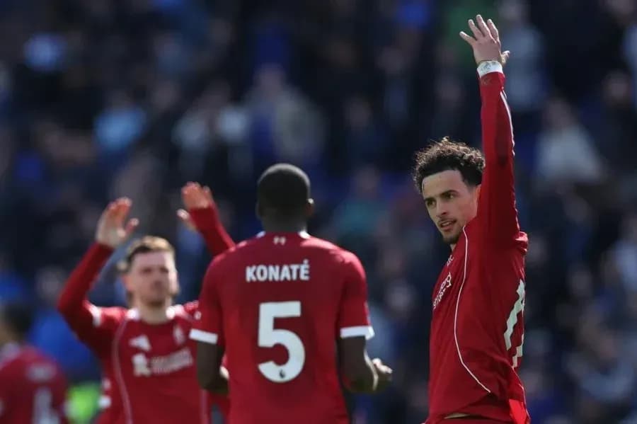 Players celebrating on the pitch during match Players celebrating on the pitch during match