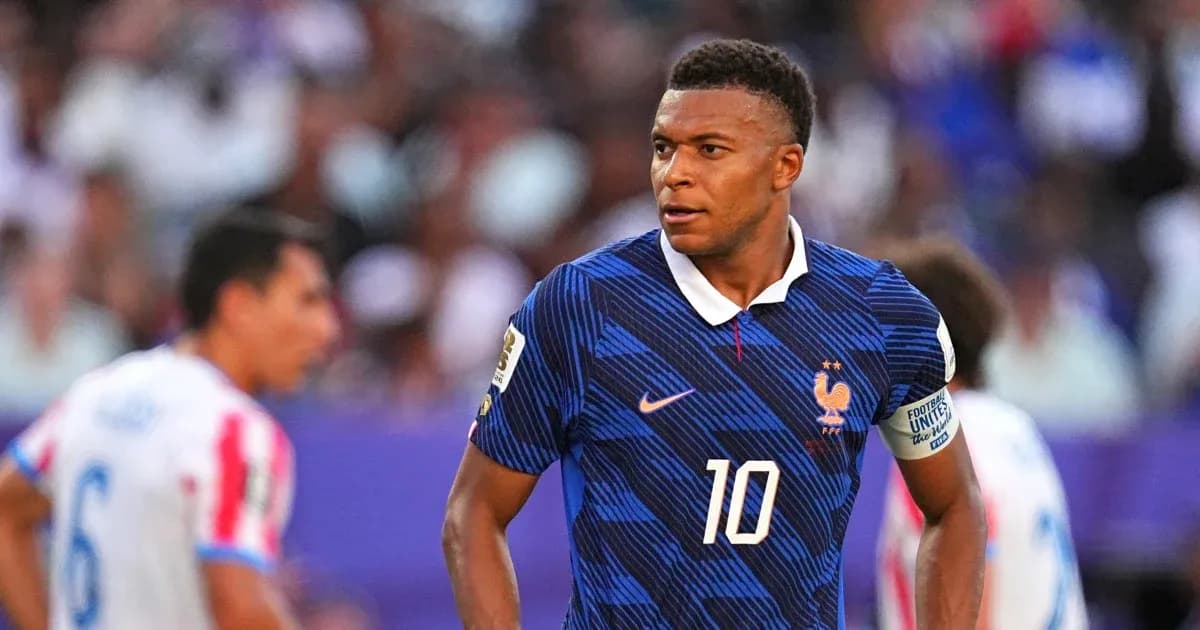 Kylian Mbappé playing for France during a match Kylian Mbappé playing for France during a match