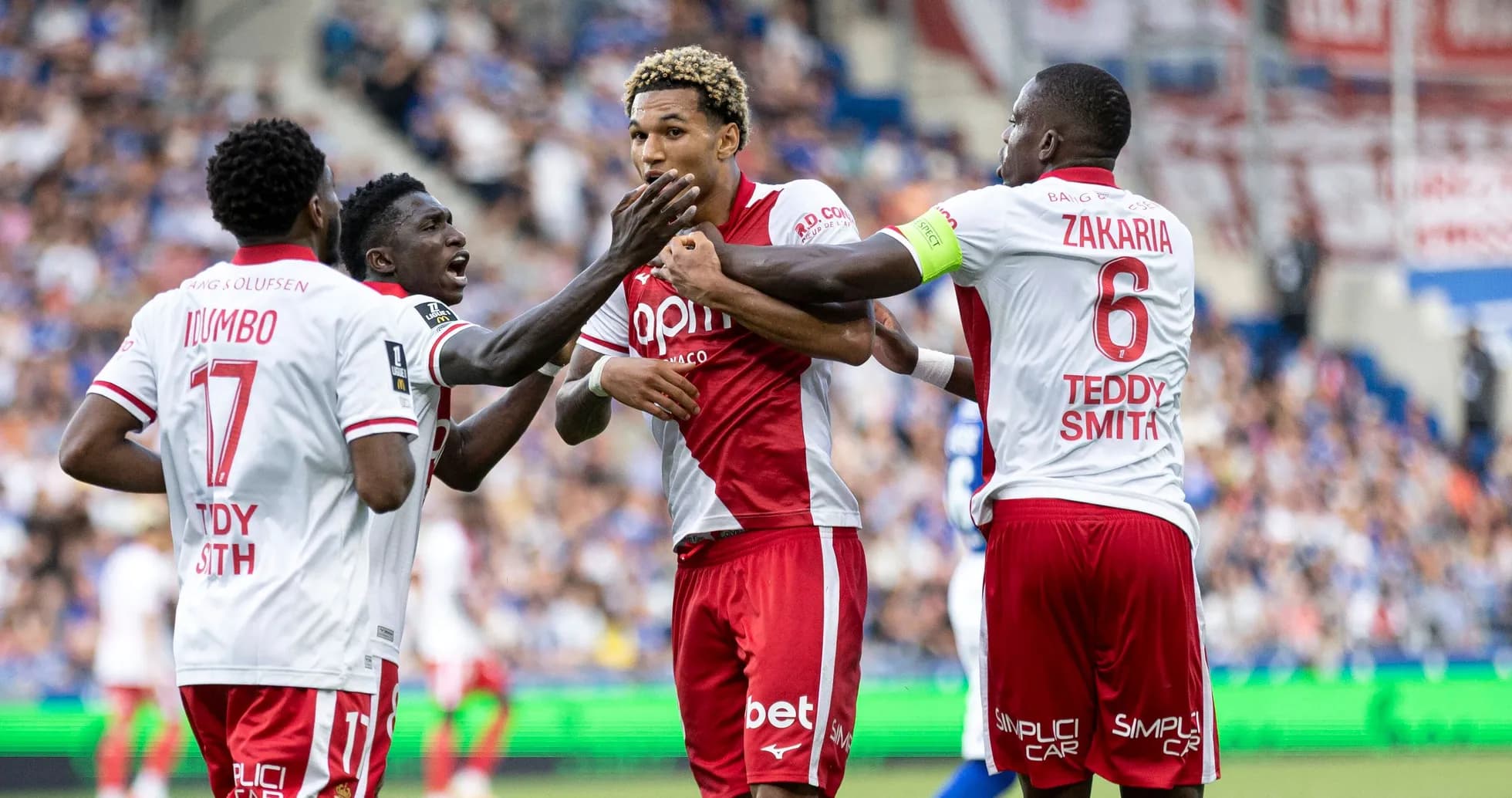 Players celebrating after a goal during match Players celebrating after a goal during match