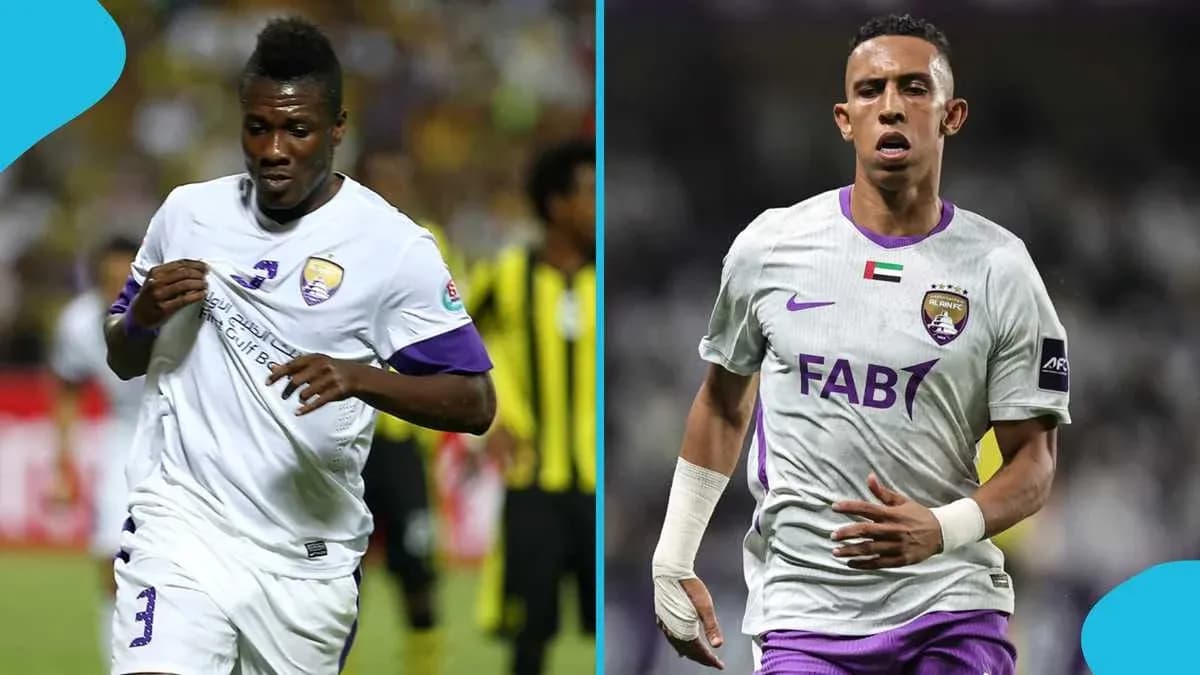 Two players from Al Ain FC running on the field Two players from Al Ain FC running on the field