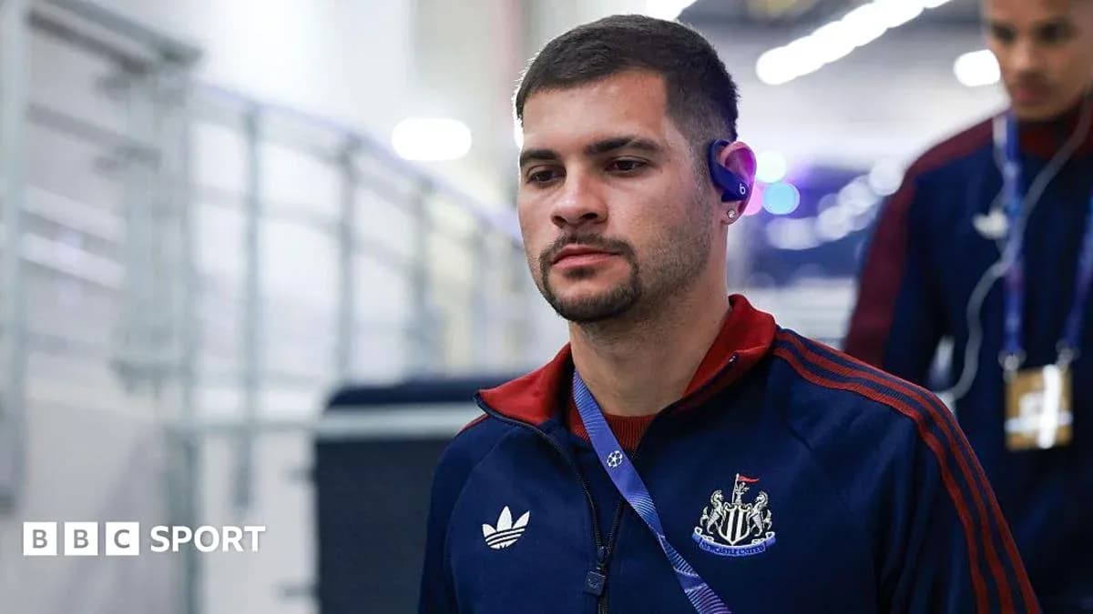 Player walking in Newcastle United training gear Player walking in Newcastle United training gear