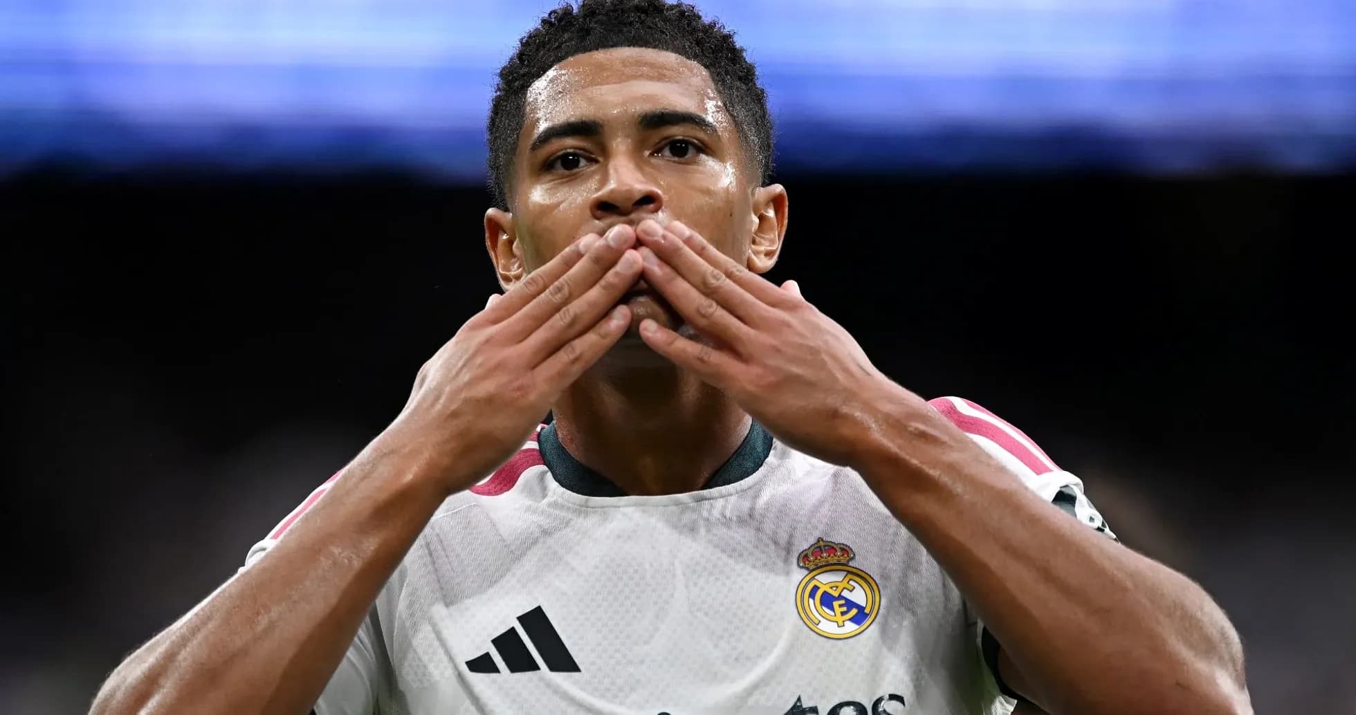Player celebrating with hand gestures after scoring Player celebrating with hand gestures after scoring