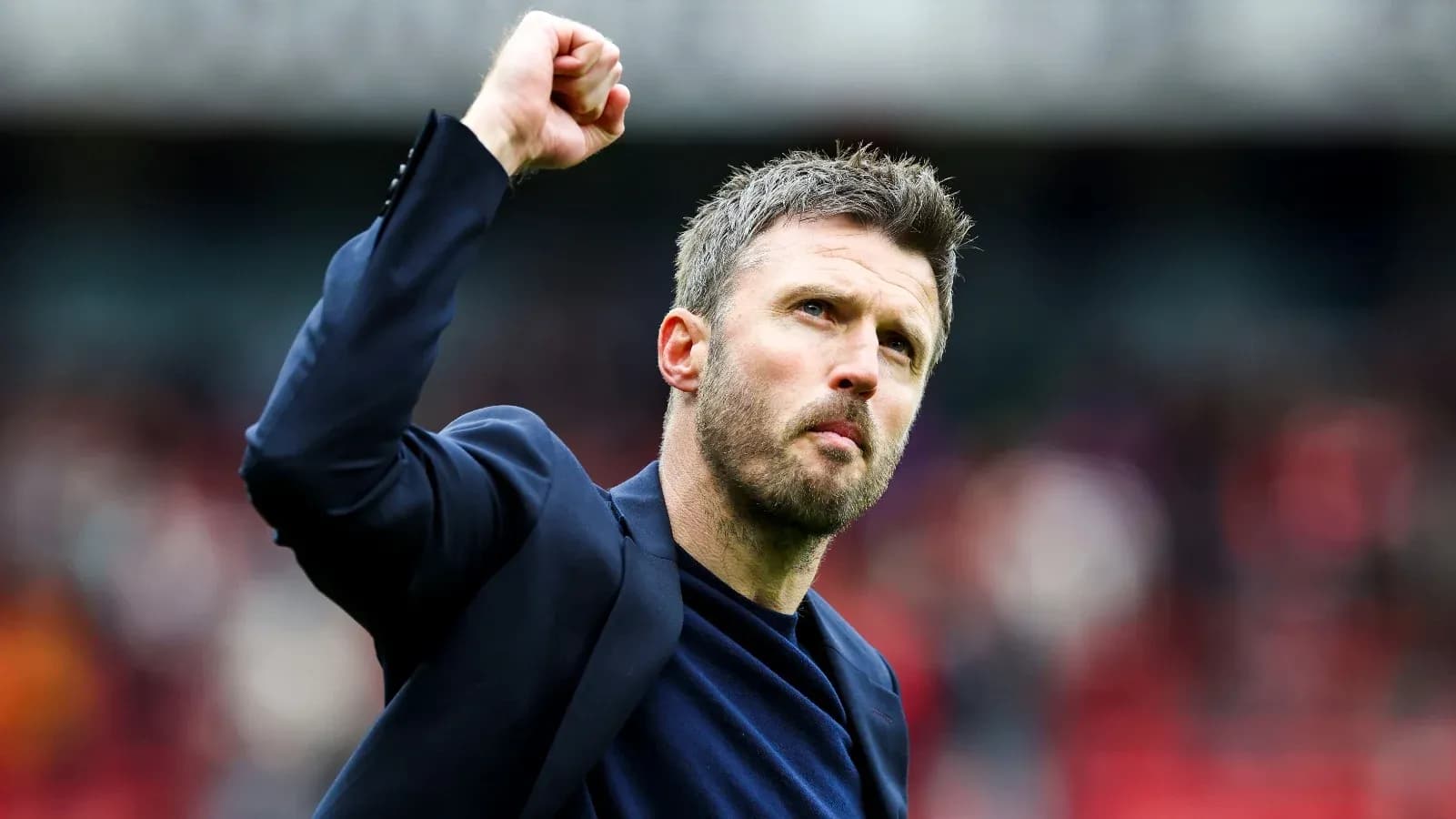 Coach celebrating with raised fist after match Coach celebrating with raised fist after match