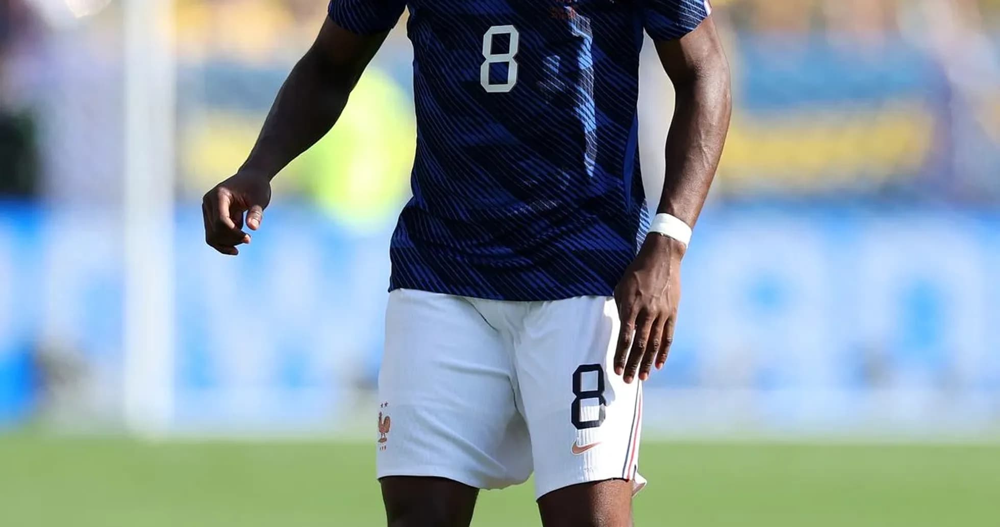 Player in France kit preparing for play on field Player in France kit preparing for play on field