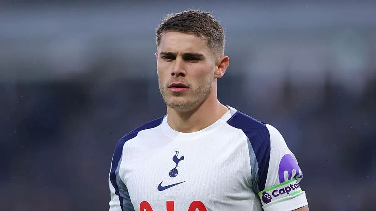 Player in Tottenham jersey with captain's armband Player in Tottenham jersey with captain's armband