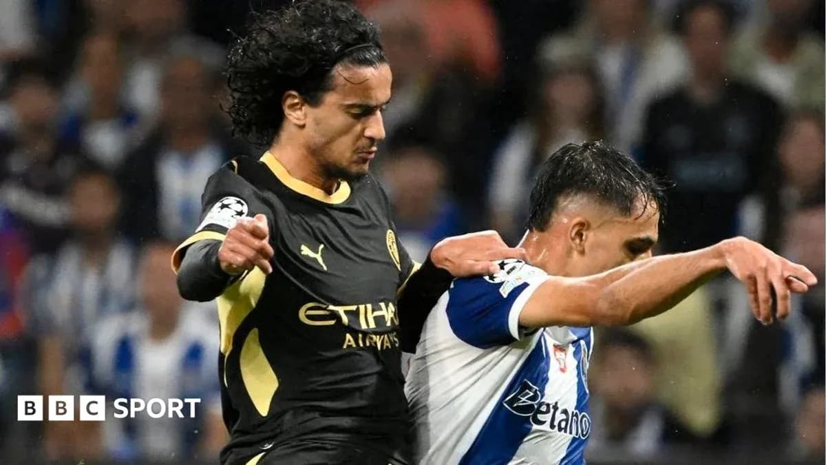 Two players challenging for the ball during match Two players challenging for the ball during match