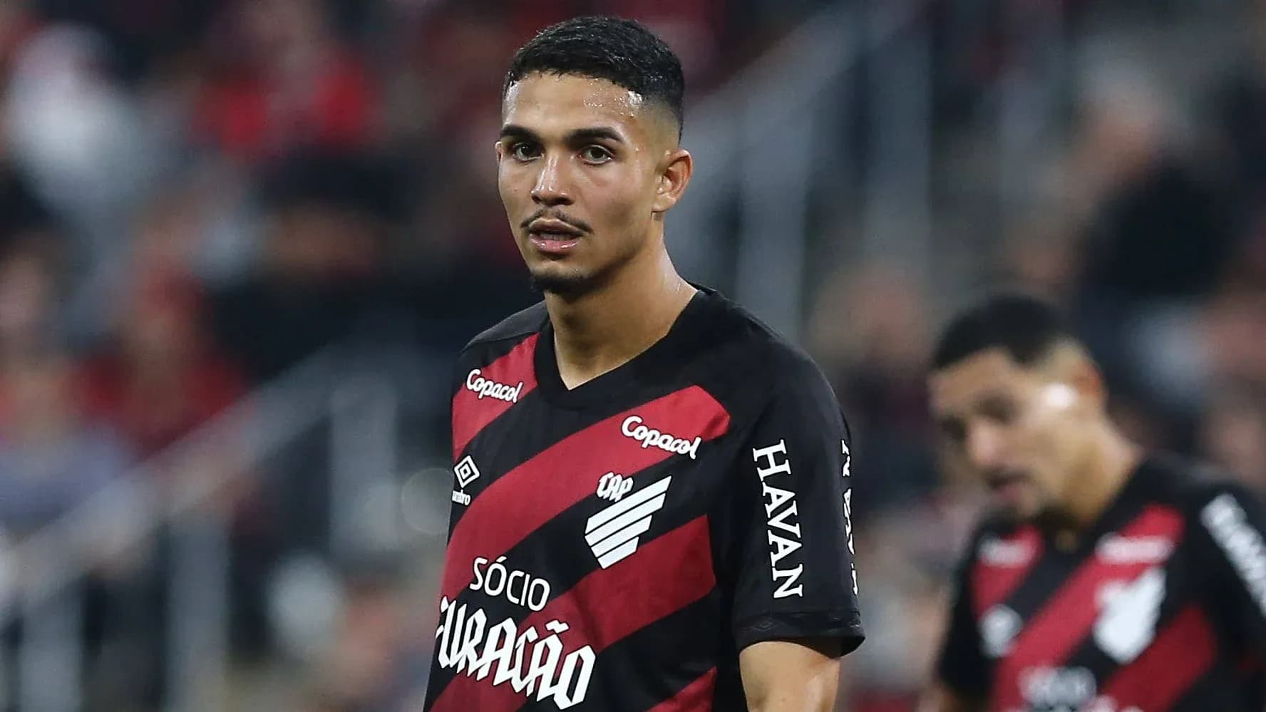 Player in Athletico Paranaense jersey on field Player in Athletico Paranaense jersey on field