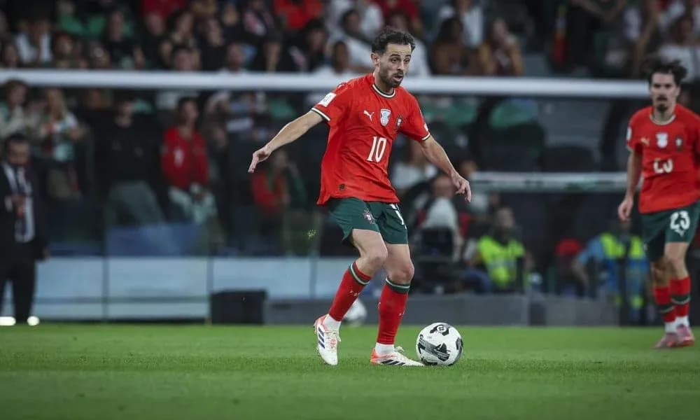 Player in red jersey controlling ball during match Player in red jersey controlling ball during match