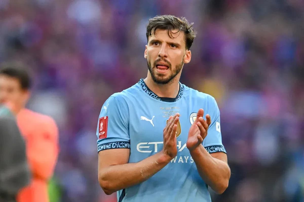 Player applauding fans after match in blue jersey Player applauding fans after match in blue jersey