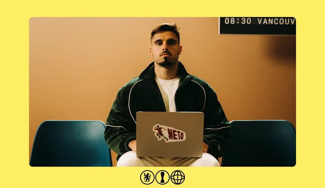 Man sitting with laptop, wearing green jacket Man sitting with laptop, wearing green jacket