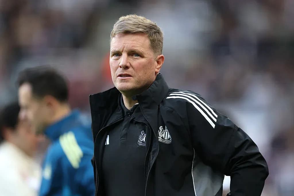 Newcastle United manager observing the match Newcastle United manager observing the match
