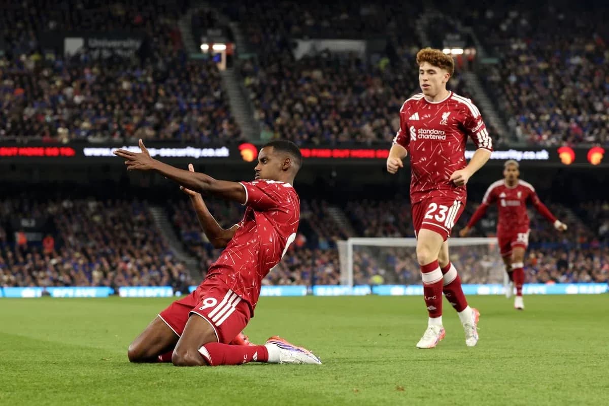 Liverpool players celebrating during a match Liverpool players celebrating during a match