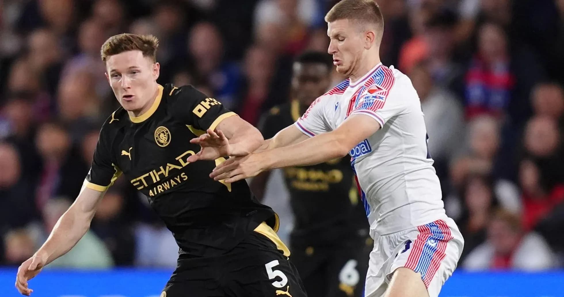 Player tackling during Crystal Palace vs Manchester City match Player tackling during Crystal Palace vs Manchester City match