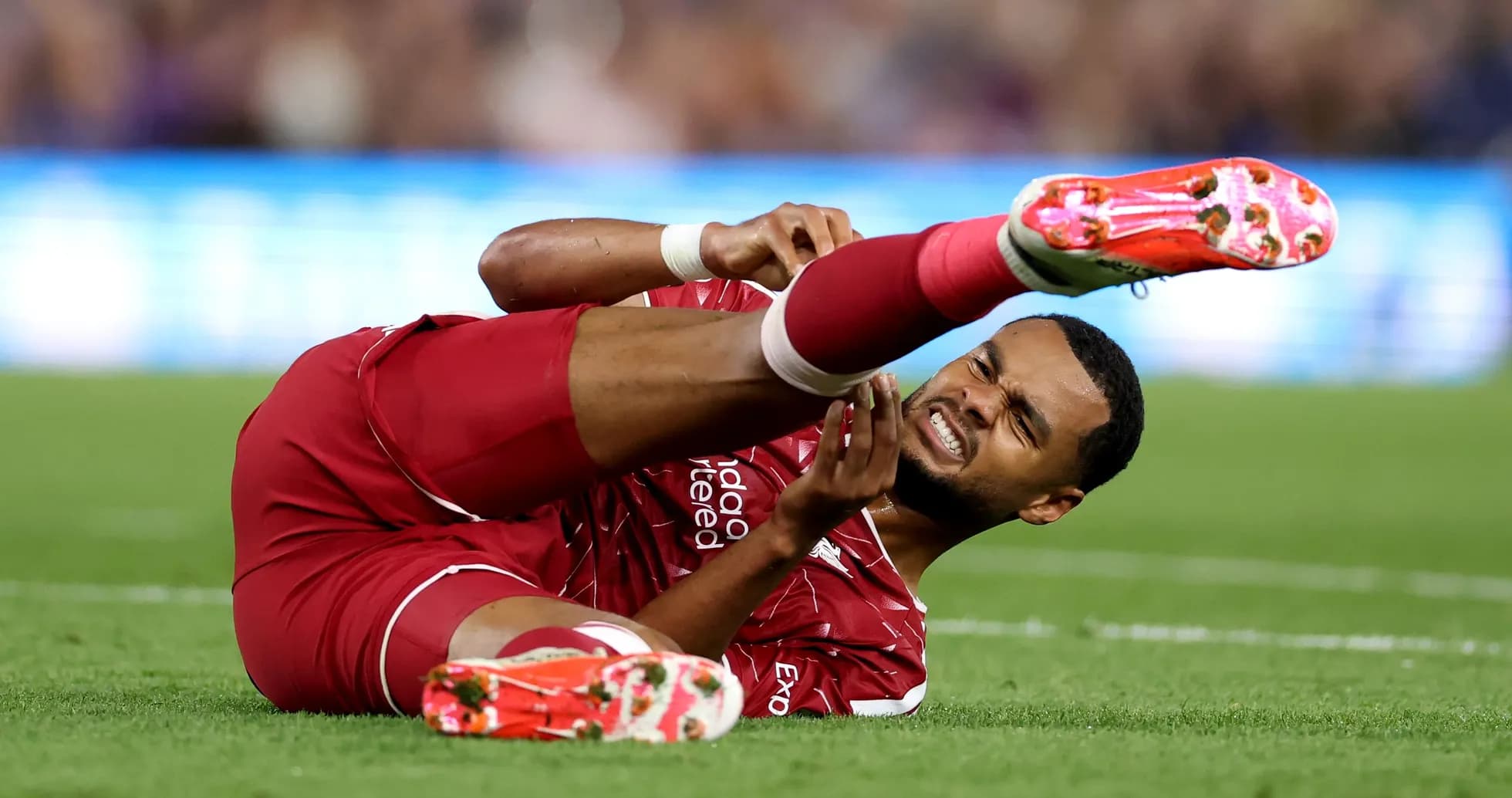 Player lying on the ground with an injury Player lying on the ground with an injury