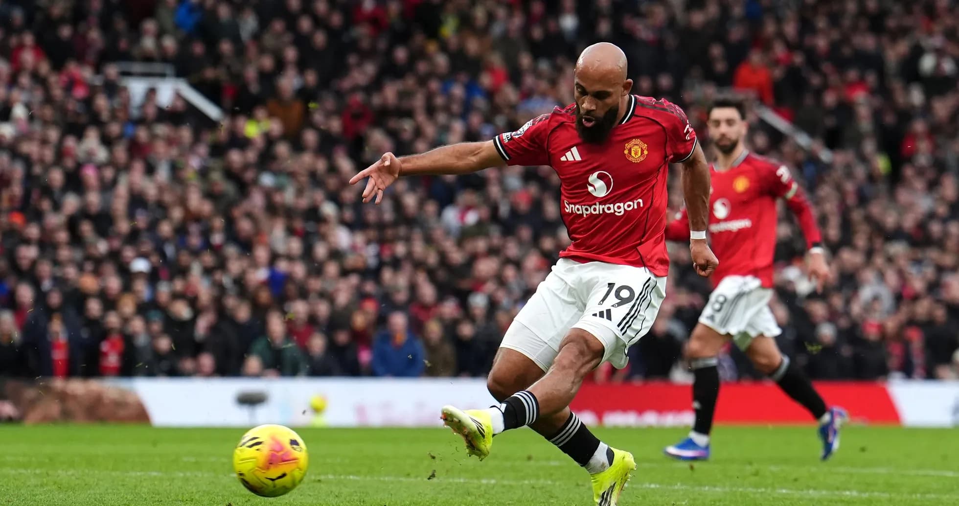 Player kicking ball during Manchester derby Player kicking ball during Manchester derby