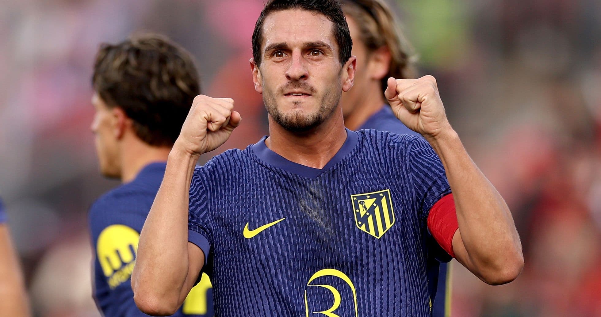 Atletico Madrid player celebrating during match Atletico Madrid player celebrating during match