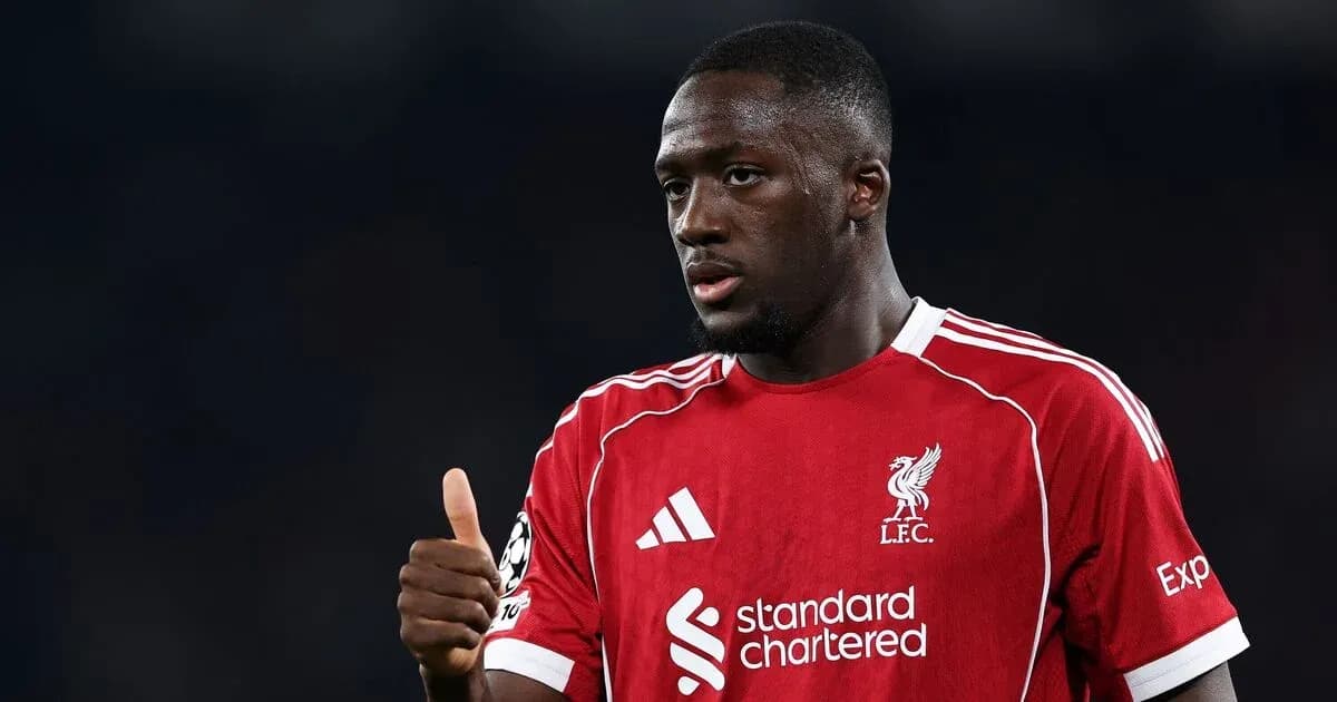 Player giving thumbs up in Liverpool jersey Player giving thumbs up in Liverpool jersey