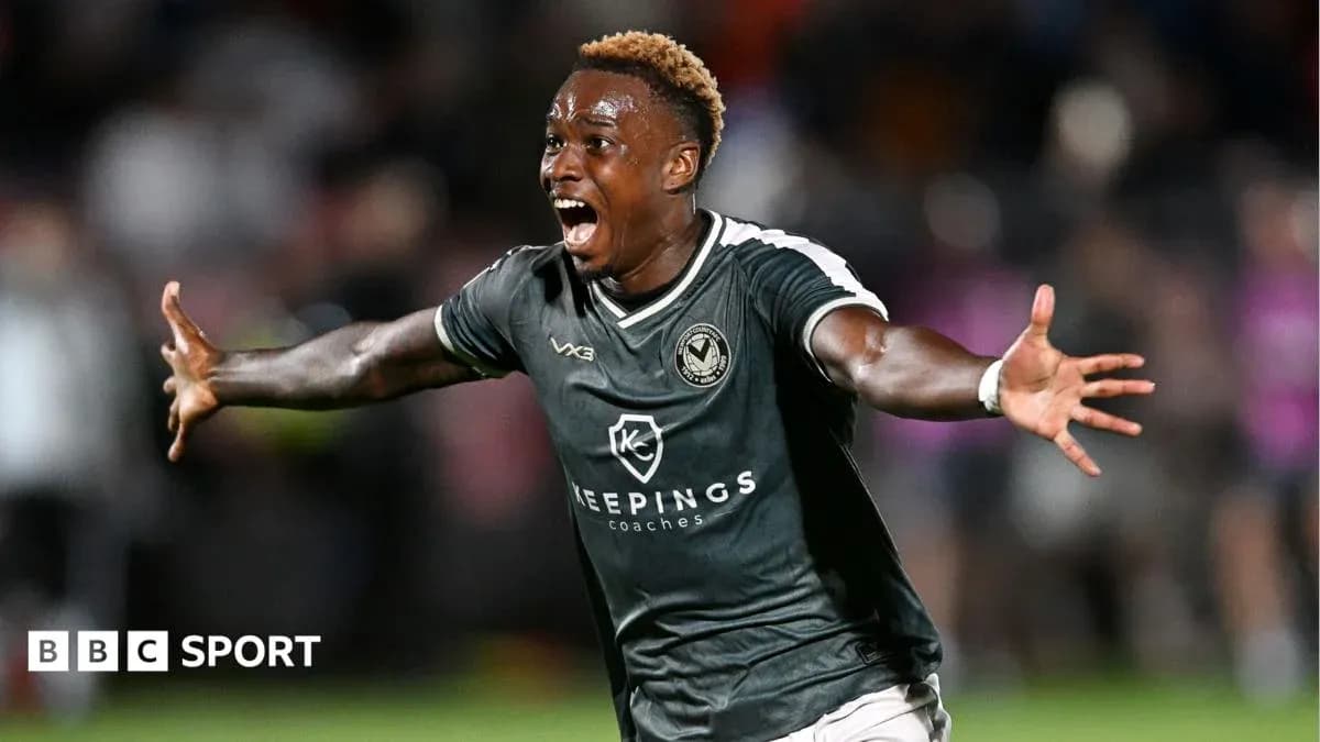 Player celebrating a goal during a match Player celebrating a goal during a match