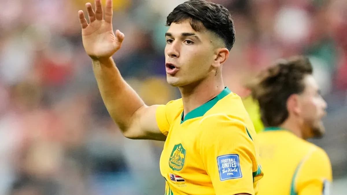 Player gesturing during match in yellow jersey Player gesturing during match in yellow jersey