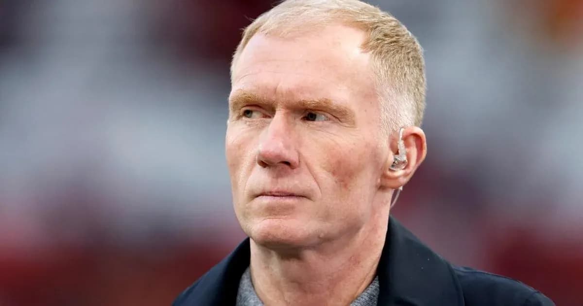 Person with short hair and earpiece on field Person with short hair and earpiece on field