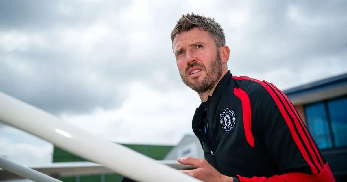 Man wearing Manchester United training gear outdoors Man wearing Manchester United training gear outdoors